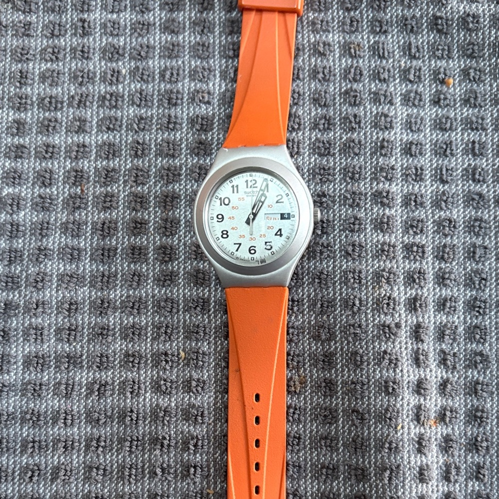 Swatch Handwetket YGS701
Irony Big Orange Watch